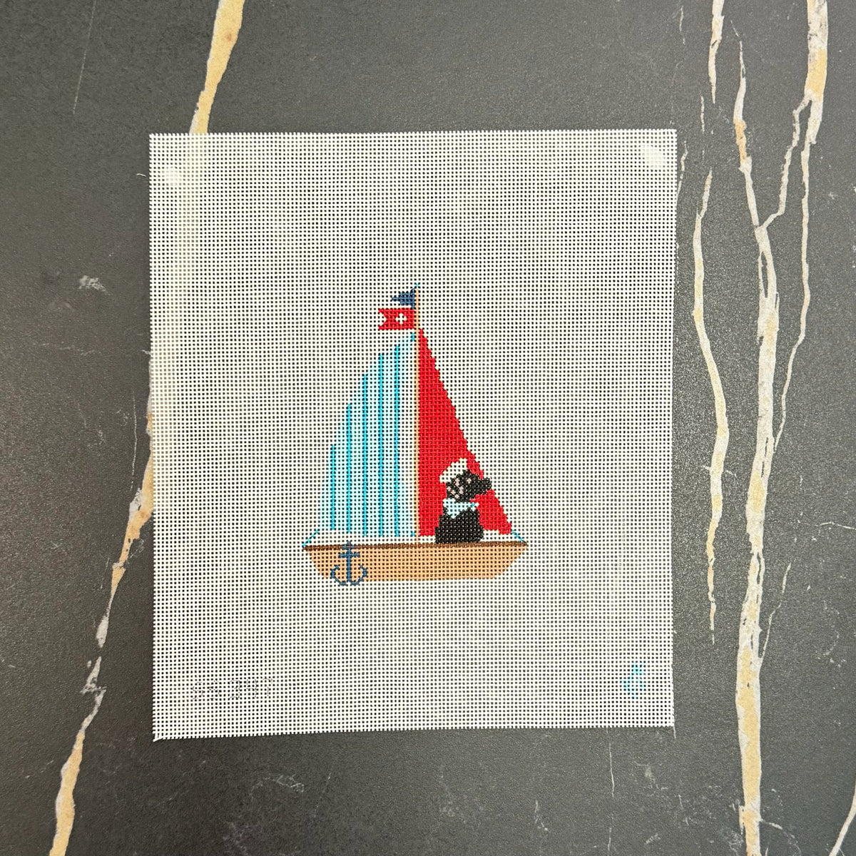 Black Labrador in Sailboat